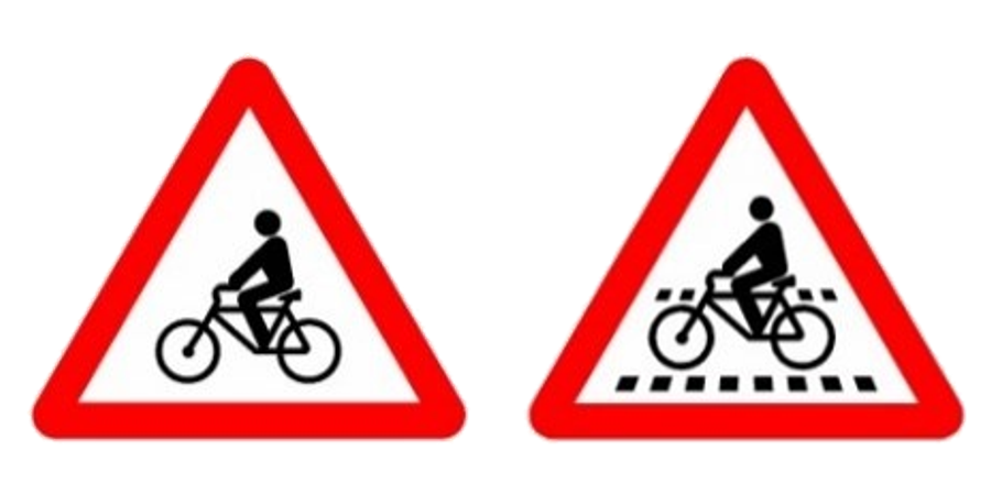 Dos señales de peligro juntas: ciclistas a la izquierda y paso para ciclistas a la derecha.