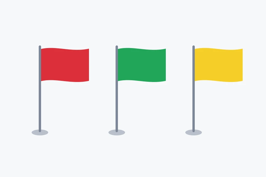 Tres banderas lisas colocadas en fila: una roja, una verde y una amarilla