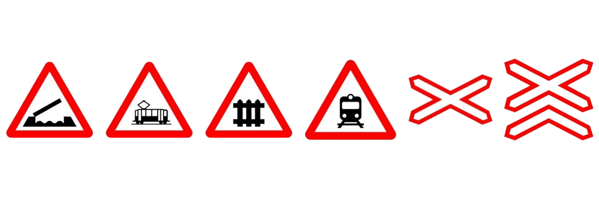 Seis señales: puente móvil, cruce de tranvía, paso a nivel con barreras, paso a nivel sin barreras y la cruz del paso sin barreras, con una vía férrea y con más de una