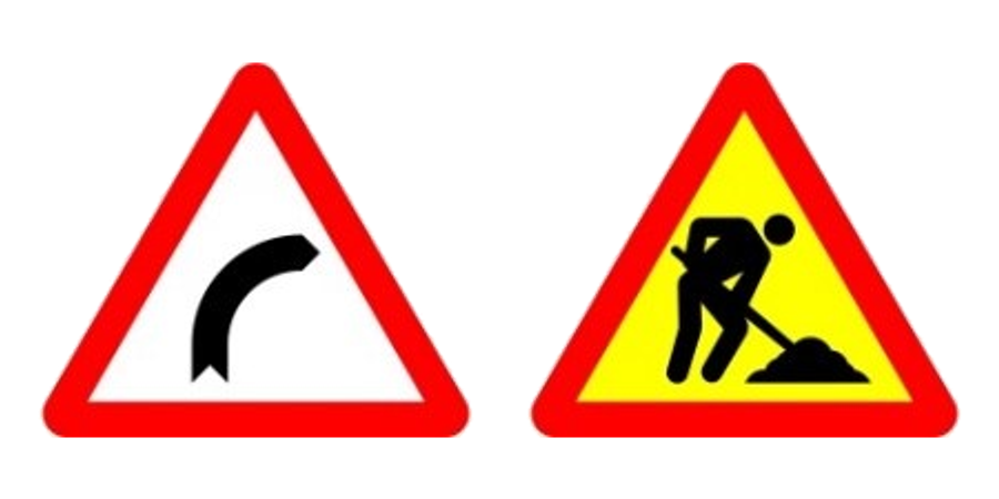 Dos señales de peligro: la de curva peligrosa con fondo blanco y la de obras con fondo amarillo