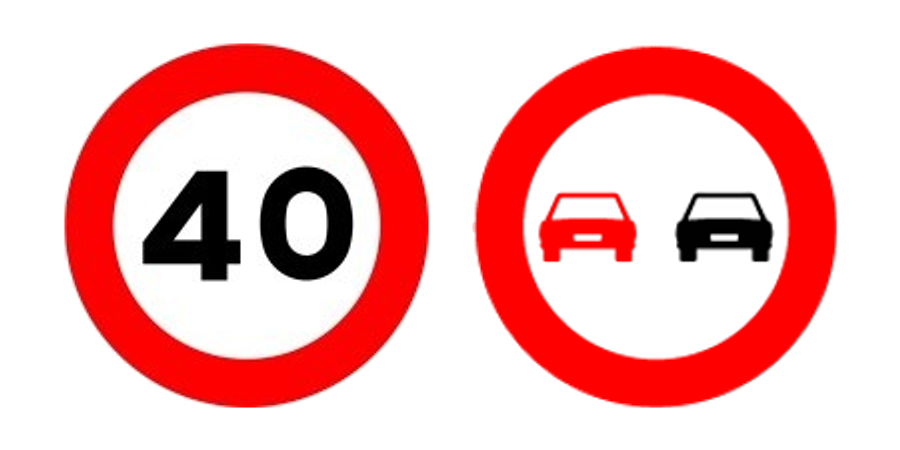 Las señales de velocidad máxima y de adelantamiento prohibido, con su fondo blanco habitual, una junto a otra