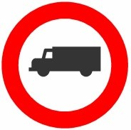 Señal: Entrada prohibida a vehículos destinados al transporte de mercancías: camiones, tractocamiones y furgones o furgonetas, independientemente de su masa
