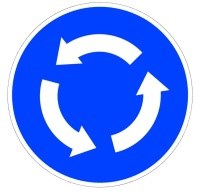 Señal: Sentido obligatorio en glorieta: las flechas señalan la dirección y sentido del movimiento giratorio que los vehículos deben seguir