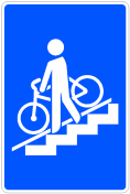 Señal: Paso inferior para peatones con rail o rampa para ciclos: situación de un paso inferior para peatones acondicionado con rail o rampa para ciclos
