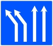 Señal: Bifurcación de dos carriles hacia la izquierda en calzada de cuatro carriles: en una calzada con cuatro carriles en el mismo sentido, se producirá una bifurcación con cambio de dirección en los dos carriles izquierdos